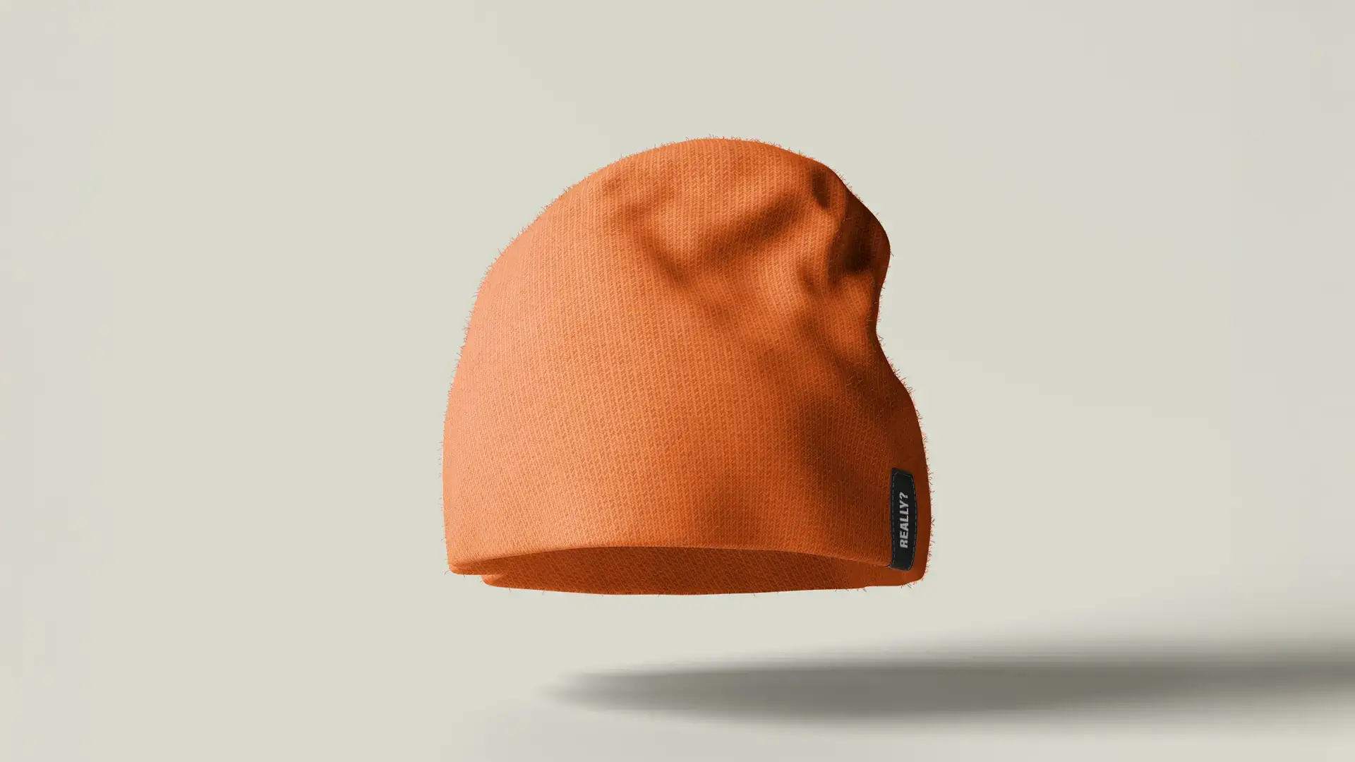 Orange beanie with the inscription